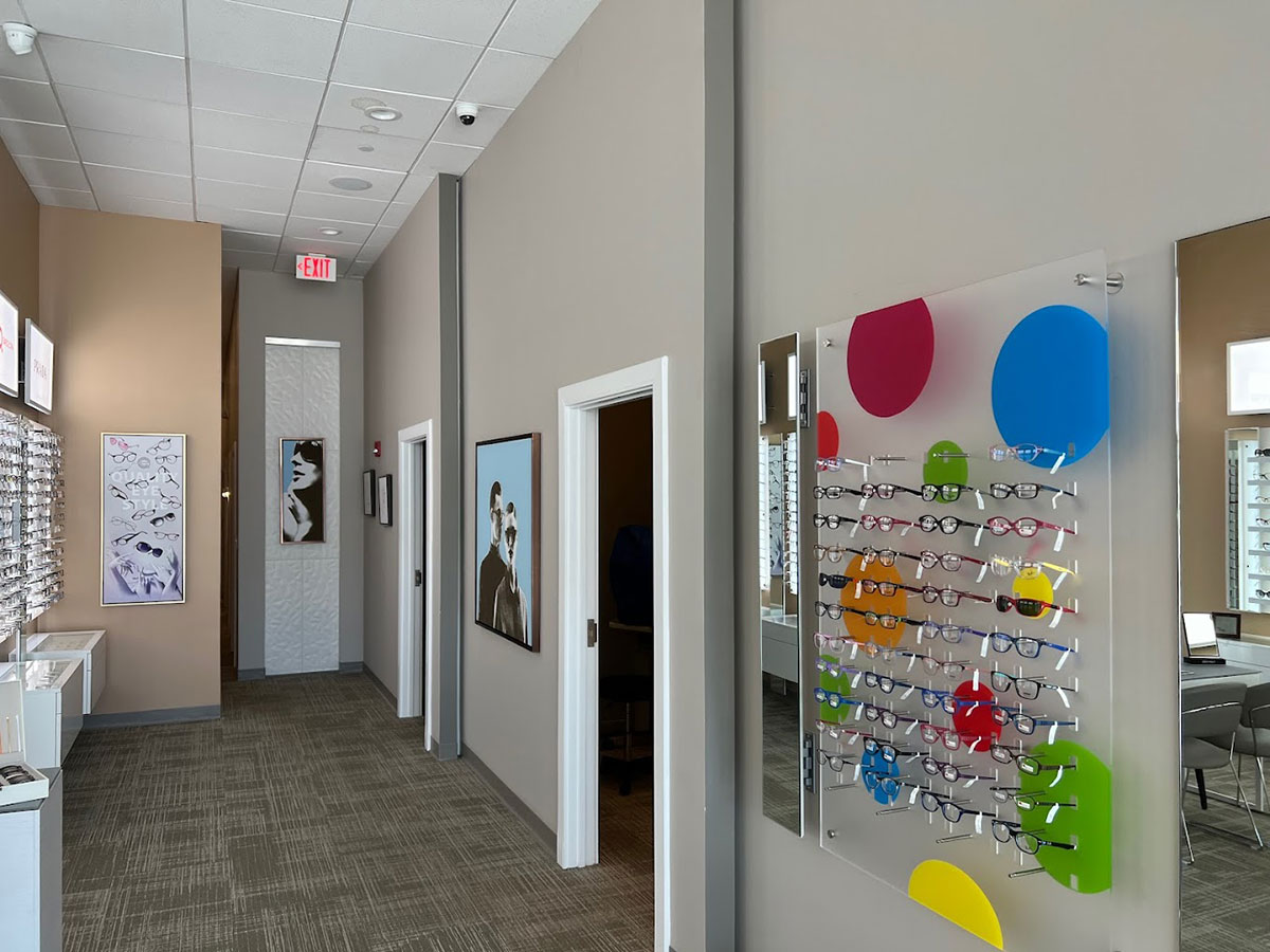 Interior Quality Eye Clinic office with children's eye glasses frames