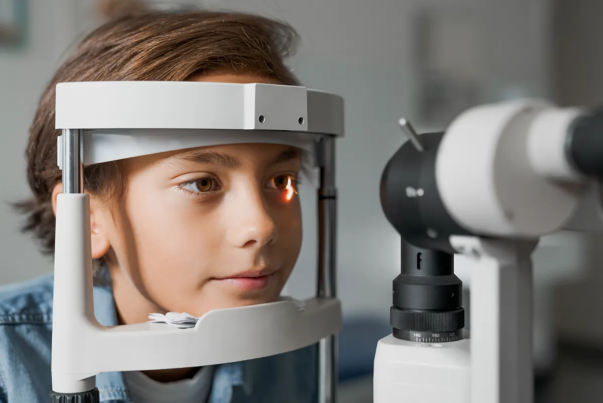 a little boy getting an eye exam